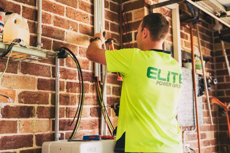 Electrician installing a new wall socket during a residential upgrade in Gauteng
